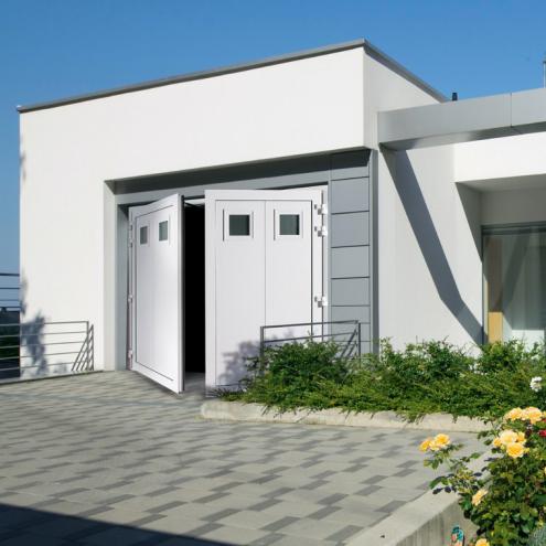 Porte sectionnelle battante